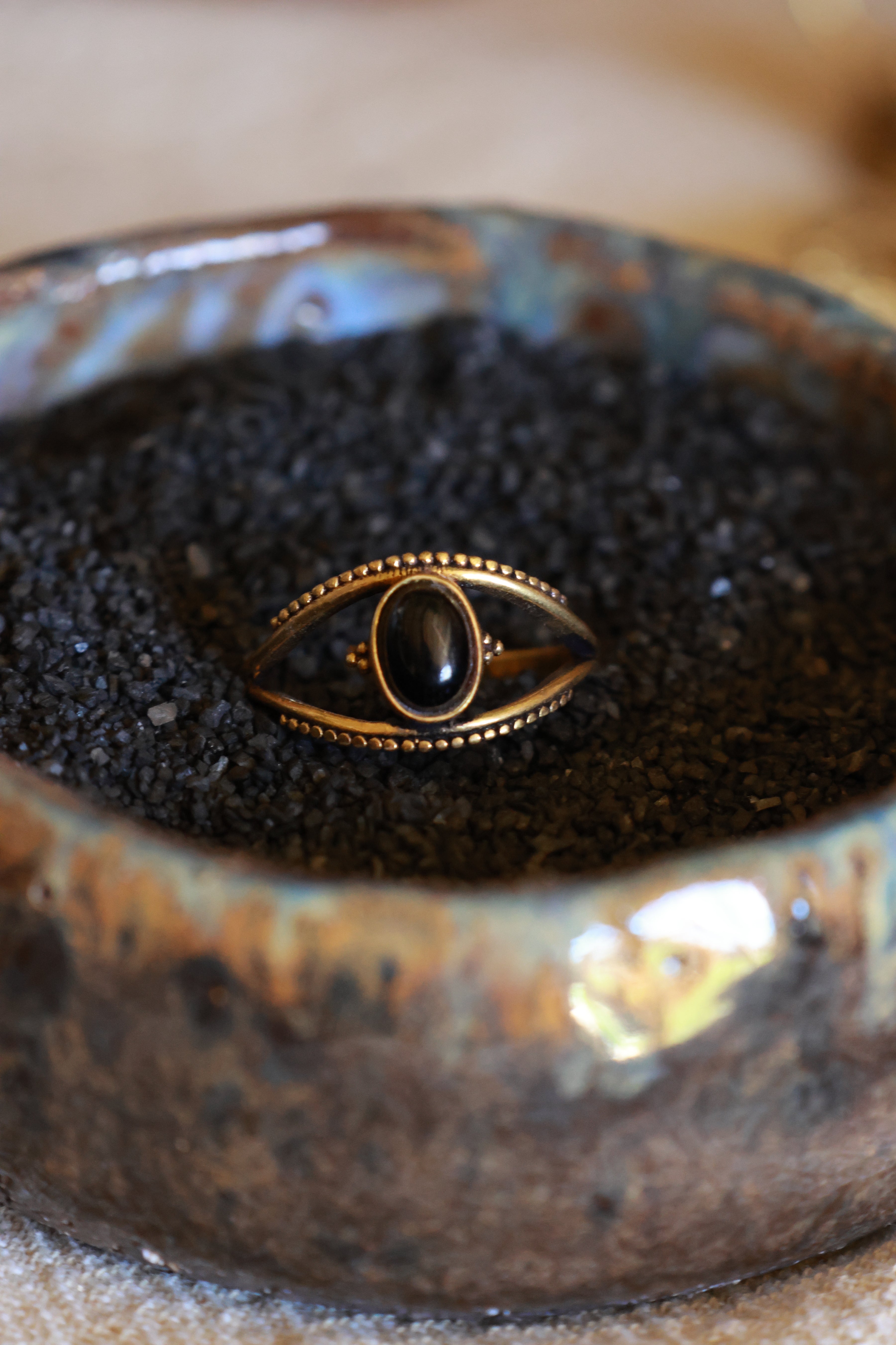 Brass eye ring